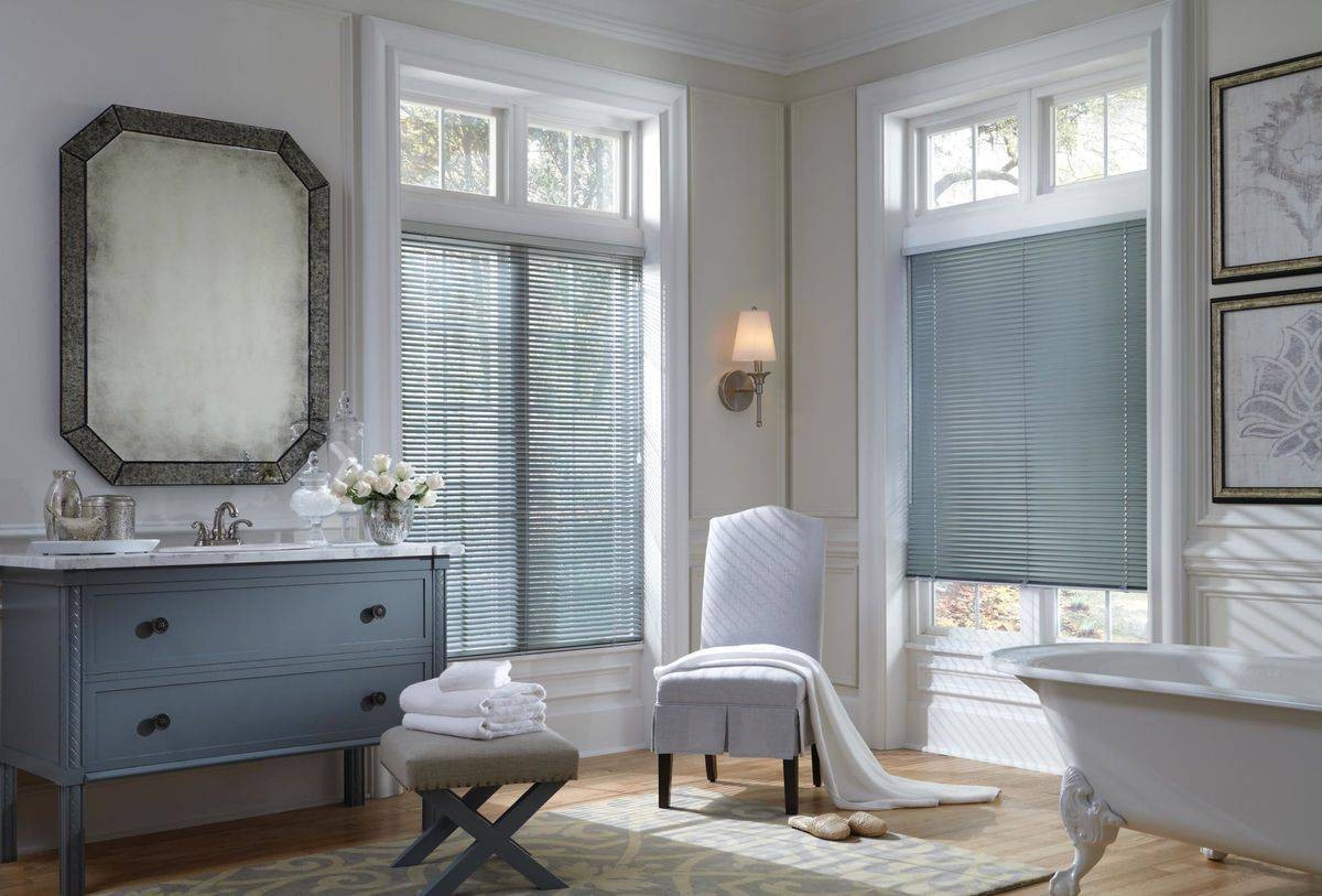 Hunter Douglas Modern Precious Metals® Mini Blinds hanging in an elegantly decorated bathroom near Honolulu, HI